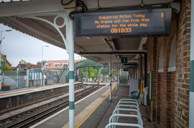 An information board at Billingshurst railway station in West Sussex advises that due to strike action no trains are running, August 18, 2022.