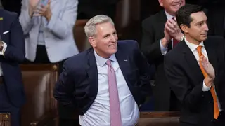 Rep. Kevin McCarthy, R-Calif., smiles after being nominated for a 15th vote in the House chamber as the House meets for the fourth day to elect a speaker and convene the 118th Congress in Washington,