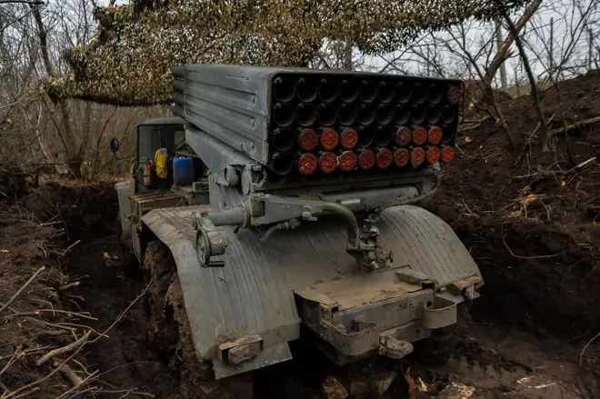 Donetsk Region, Ukraine. 26th Dec, 2022. Hiding among the trees near Soledar sits a Ukrainian multiple launch rocket system.