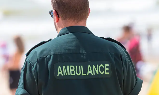 Paramedic wearing his ambulance uniform