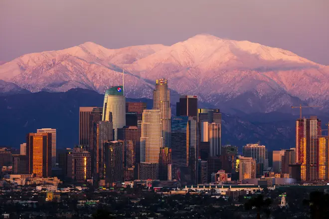 Los Angeles Skyline framed by the San Bernardino Mountains and Mount Baldy