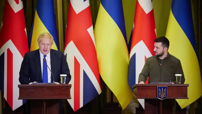 Johnson stands alongside Zelensky on an official visit while PM last year