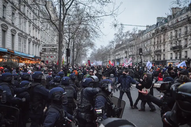 Demonstrators clash with police during a demonstration against pension reform in Paris, France on January 19, 2023.