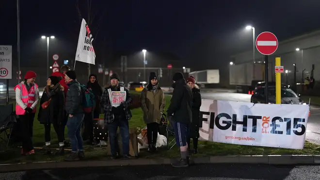 Members of the GMB union on the picket line outside the Amazon fulfilment centre in Coventry