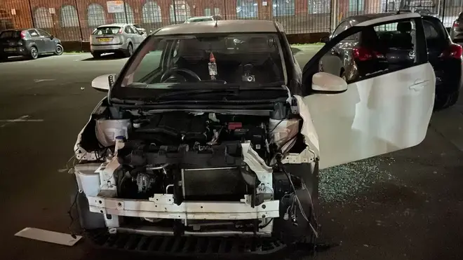 The car after being stripped for parts