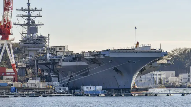 Aircraft carrier USS Ronald Reagan is moored at port in Japan