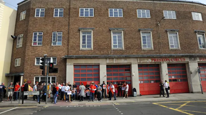 FBU members rally outside a Brighton fire station