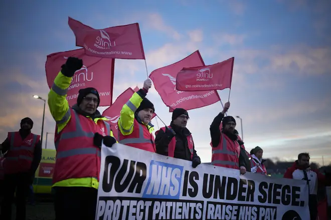 Striking ambulance workers on the picket line at the North West Ambulance Service NHS Trust