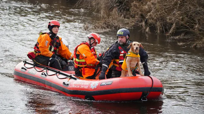 Specialist teams search the river