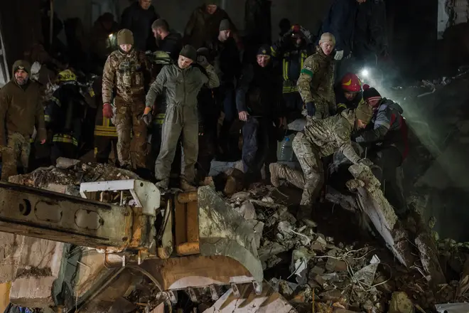 Ukrainian military with rescuers and local residents conduct a search and rescue operation on February 02, 2023 in Kramatorsk, Ukraine.