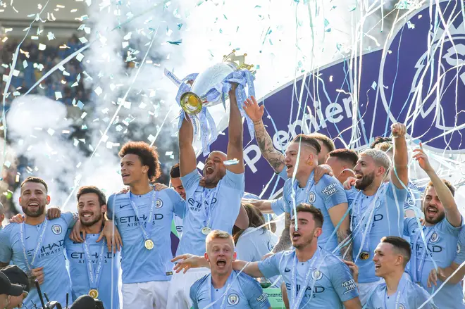 Manchester City celebrate winning the Premier League