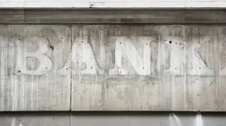 Faded signage on a bank branch