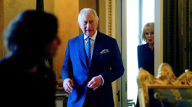 King Charles III in a blue suit