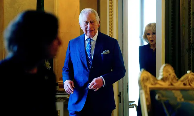 King Charles in blue suit