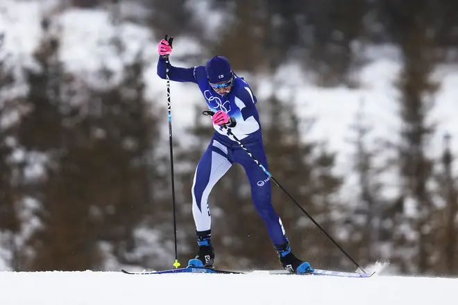 Remi Lindholm of Team Finland competes during the Men's Cross-Country Skiing 50km Mass Start Free on Day 15 of the Beijing 2022 Winter Olympics.