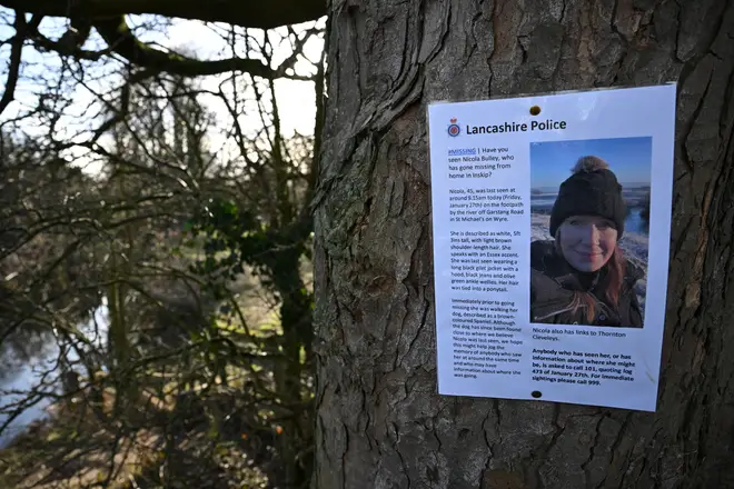 A poster asking for information on missing Nicola 'Nikki' Bulley is pictured on a tree close to where her phone and dog's harness were discovered