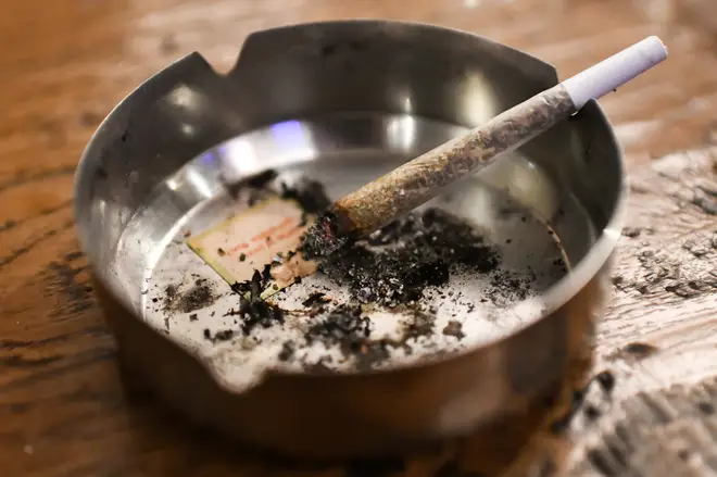 A join in an ashtray at the Coffeeshop in Amsterdam's Red Light District on December 10, 2022.