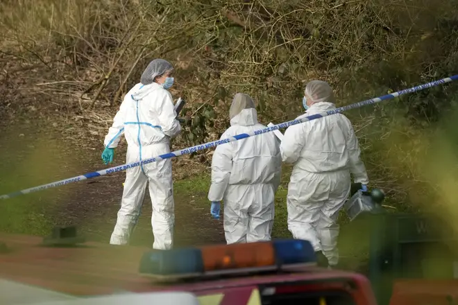 Police forensic scientists attend the scene, February 13, 2023.