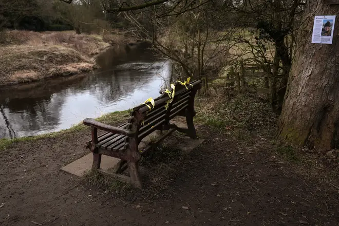 Yellow ribbons adorn a bench, where Nicola Bulley's phone was found, next to the River Wyre in St Michael's on Wyre on February 20, 2023 in Preston, England.