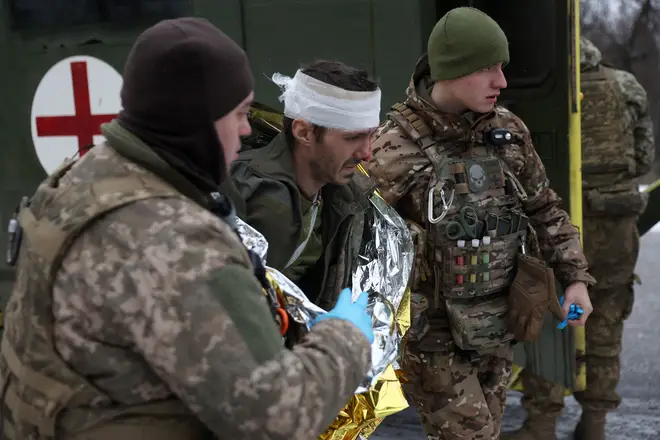 Medics of Ukrainian Army evacuate a wounded soldier