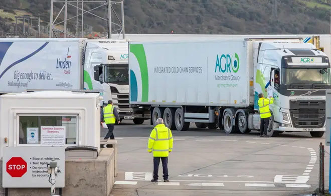 Officials check freight at the Port of Larne in County Antrim, Northern Ireland on January 1, 2021