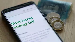 A phone showing an energy bill