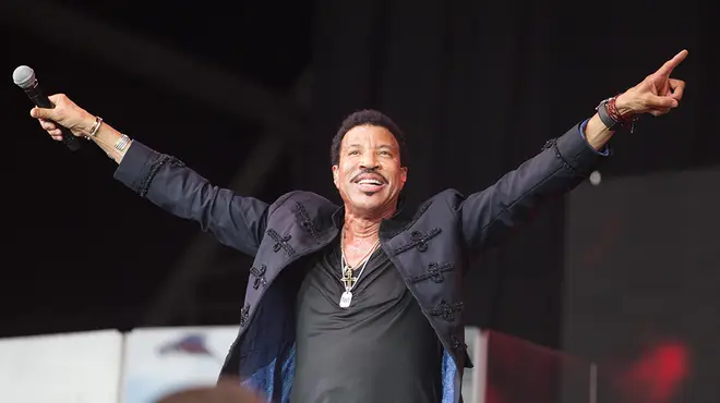 Lionel Richie performing on stage