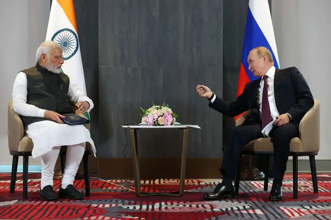 Russian President Vladimir Putin meets with India's Prime Minister Narendra Modi