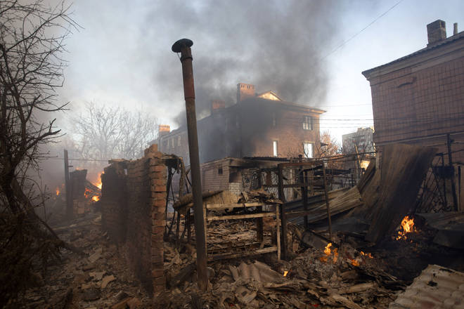 A building burns after shelling in Bakhmut