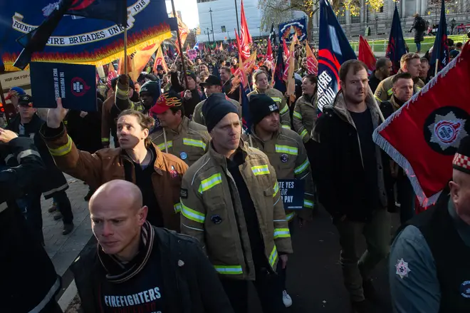 Several thousand firefighters march in London to demand higher pay in December