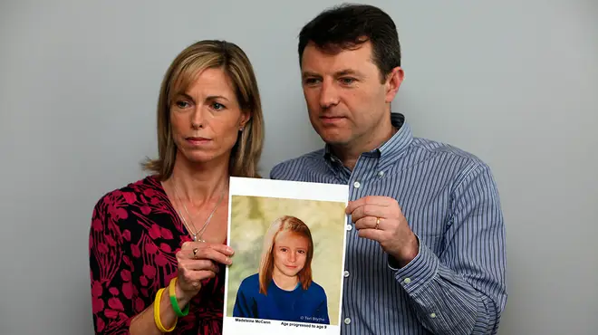 Gerry and Kate McCann holding a picture of missing Madeleine