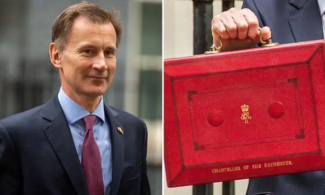 Jeremy Hunt and the red chancellor of exchequer suitcase