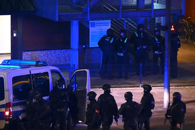 Armed police officers near the scene of a shooting in Hamburg
