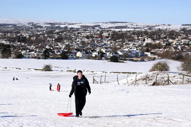 People using sledges enjoy the snow on March 10, 2023 in Bradford