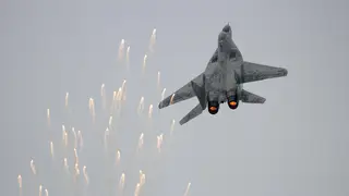 A Slovak air force MiG-29 Fulcrum fires off flares