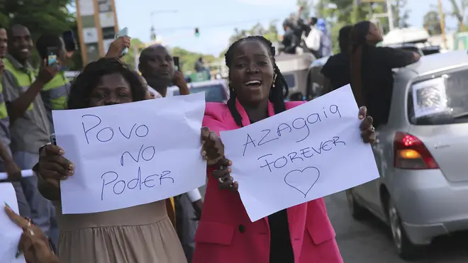 Protesters take part in a march supporting rapper Azagaia in Maputo, Mozambique
