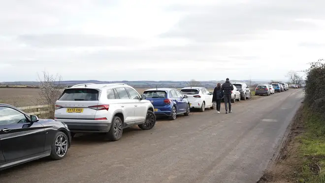 Cars parked on the grass verge at Jeremy Clarkson's Diddly Squat Farm Shop
