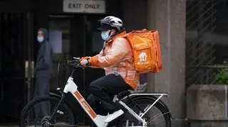 A Just Eat delivery driver on a bike in Liverpool