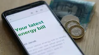 A mobile phone showing an energy bill