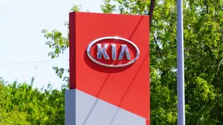 The Kia logo on a building