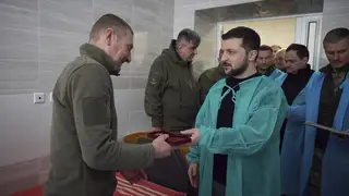 Volodymyr Zelensky awards a soldier in hospital in Donetsk region on Wednesday