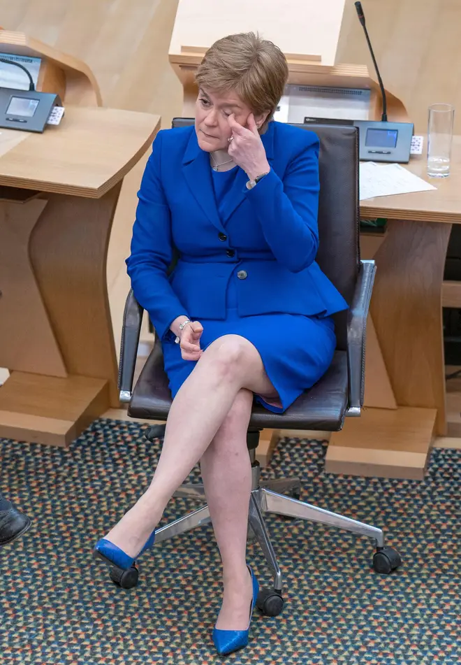 Nicola Sturgeon wipes away a tear during her final appearance as First Minister