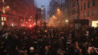 Protesters march during a rally in Paris