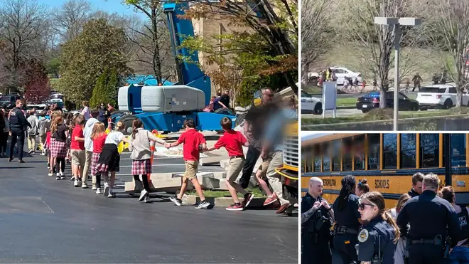 Children were pictured being led away from the scene of the shooting