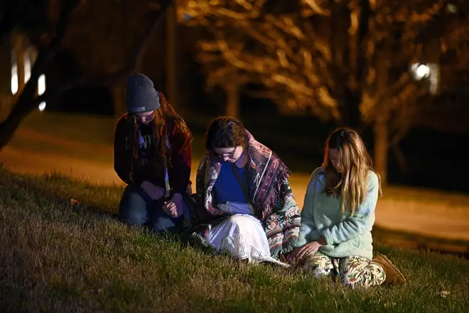 Children gather outside the Covenant School building