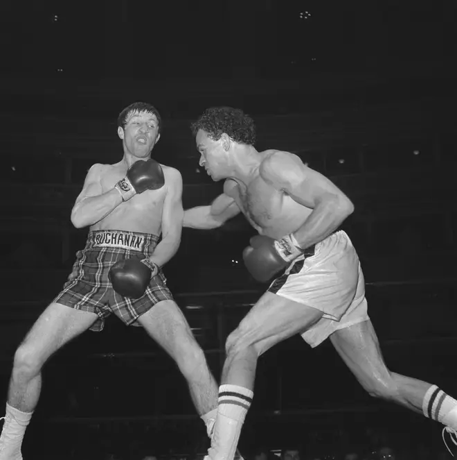 Ken Buchanan (left) takes on Puerto Rican boxer Hector Matta at the Royal Albert Hall in London, UK, 27th March 1973