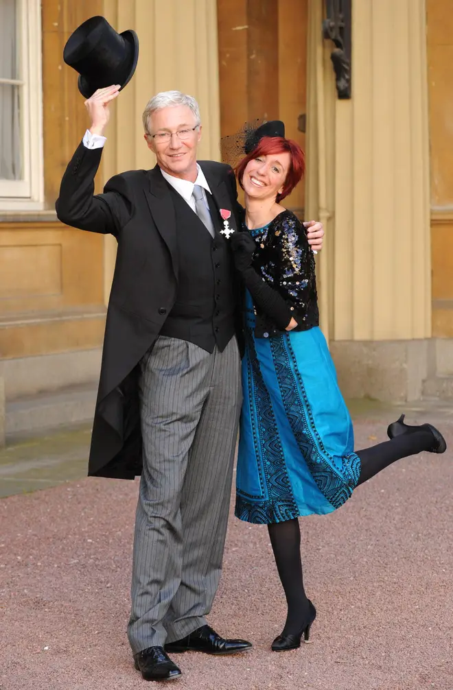 Paul and Sharon after the TV star was presented with an MBE for services to entertainment in 2008.