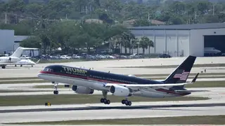The plane carrying former president Donald Trump lifts off at Palm Beach International Airport (Rebecca Blackwell/AP)
