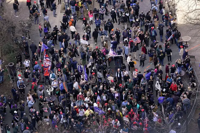 Demonstrators gather outside New York Supreme Court