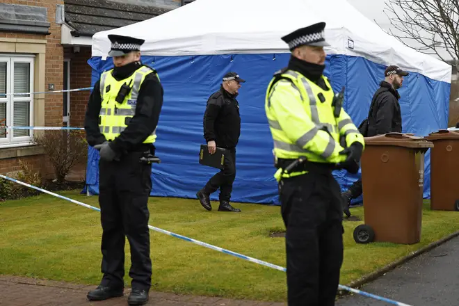 Police officers outside the home of Peter Murrell and Nicola Sturgeon on Wednesday